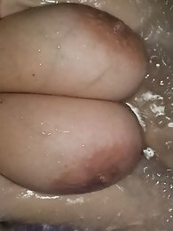 A well-endowed mature woman in a whirlpool - 76 images