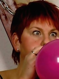 Annadevot playing with balloons in boots